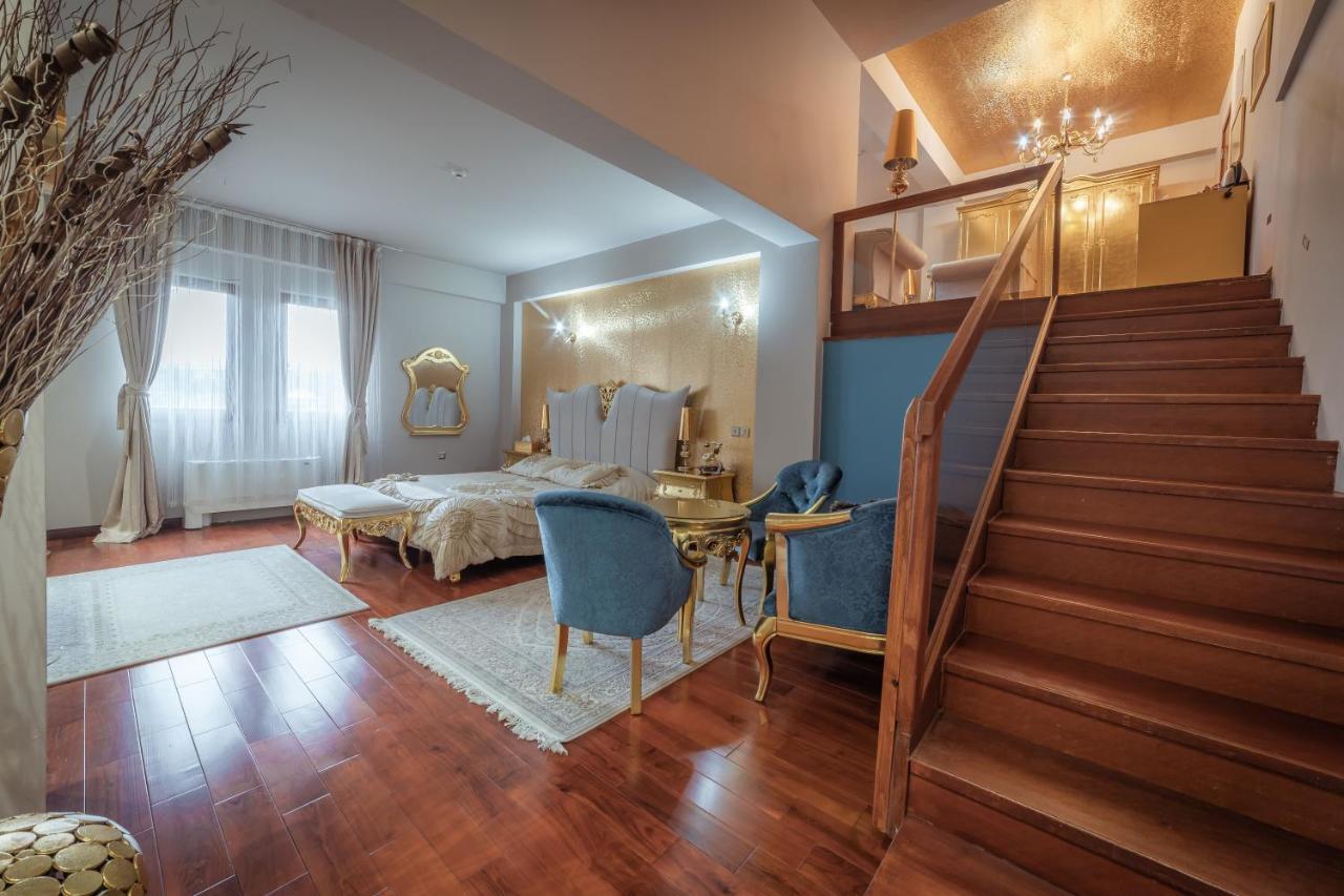 סקופיה Bushi Resort & Spa מראה חיצוני תמונה A bedroom in the hotel