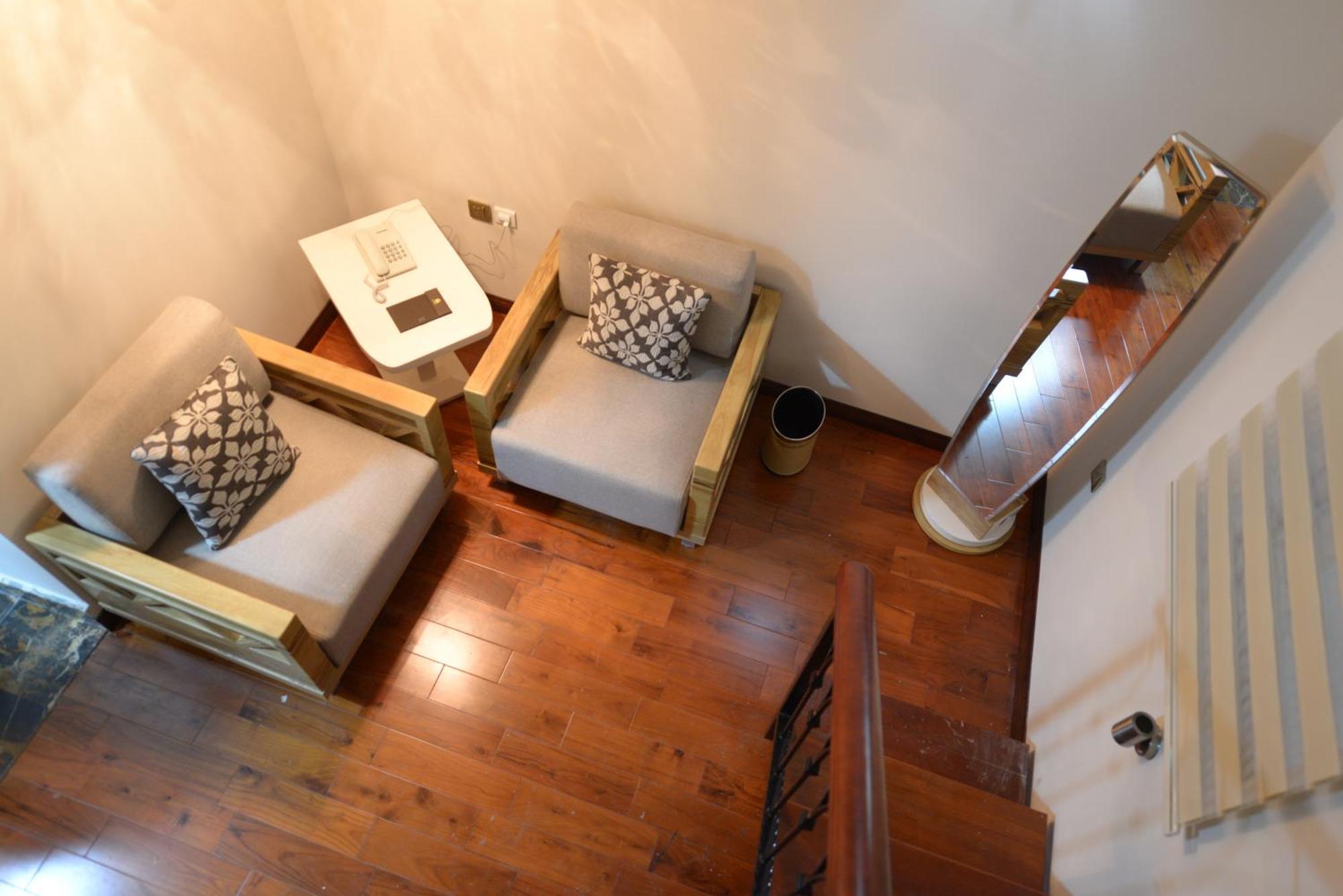 סקופיה Bushi Resort & Spa חדר תמונה A living room in a micro apartment
